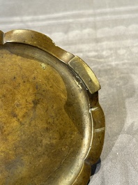 A Chinese bronze censer and stand, Xuande mark, 17th C.