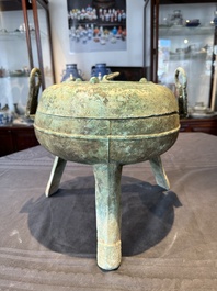 A Chinese archaic bronze tripod food vessel, 'ding 鼎', Eastern Han