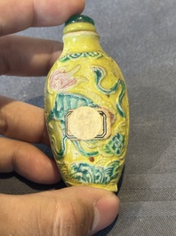 Five Chinese moulded famille rose snuff bottles, Qianlong mark, 19th C.