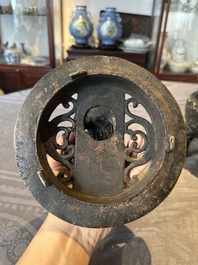 A large Chinese bronze censer and cover with a Buddhist lion, Ming