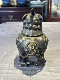 A fine Chinese bronze luduan-form censer and cover, Ming