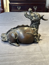 A fine Chinese bronze 'qilin' censer and cover, Ming