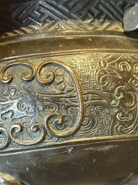 A large Chinese bronze censer and cover with a Buddhist lion, Ming
