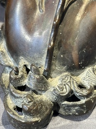 A fine Chinese bronze 'qilin' censer and cover, Ming