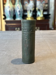 A Chinese bronze cylindrical 'cicada' flower arranging vase, Xuande mark, Ming