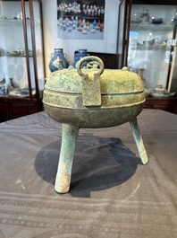 A Chinese archaic bronze tripod food vessel, 'ding 鼎', Eastern Han