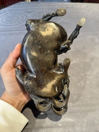 A fine Chinese bronze 'qilin' censer and cover, Ming