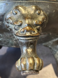 A large Chinese bronze censer and cover with a Buddhist lion, Ming
