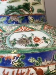 A Chinese famille verte vase with warriors on horseback, 19th C.