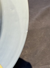 A Chinese bianco sopra bianco Belgian market armorial dish and a famille rose Dutch market armorial plate, Qianlong