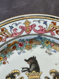 A Chinese bianco sopra bianco Belgian market armorial dish and a famille rose Dutch market armorial plate, Qianlong