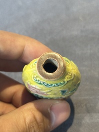 Five Chinese moulded famille rose snuff bottles, Qianlong mark, 19th C.