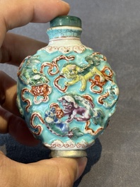 Five Chinese moulded famille rose snuff bottles, Qianlong mark, 19th C.