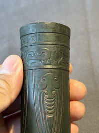 A Chinese bronze cylindrical 'cicada' flower arranging vase, Xuande mark, Ming