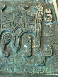 A rare large and inscribed archaistic bronze wine vessel, 'fang yi 方彝', Song/Ming