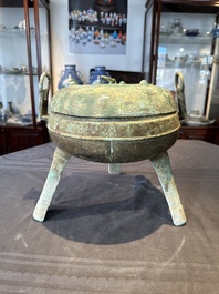 A Chinese archaic bronze tripod food vessel, 'ding 鼎', Eastern Han