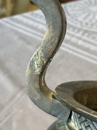 A large Chinese bronze censer and cover with a Buddhist lion, Ming