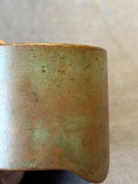A small Chinese bronze cylindric tripod censer, Xuande mark, Ming