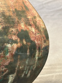 A Chinese archaic bronze vase with 'Taotie' handles, 'fang hu 方壺', Han