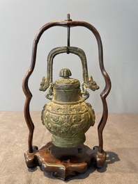 A varied collection of five Chinese bronze objects, 4th C. B.C./15th C.