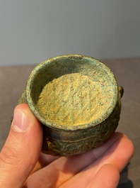 A varied collection of five Chinese bronze objects, 4th C. B.C./15th C.