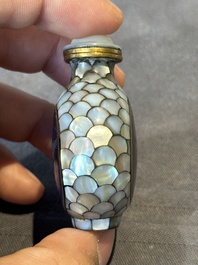 Two Chinese lacquered and mother-of-pearl-inlaid snuff bottles and a carved mother-of-pearl shell snuff bottle, Qianlong mark, 18/19th C.