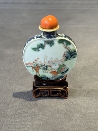 A Chinese famille rose 'Sanxing' snuff bottle, Qianlong mark and of the period