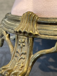 A large Chinese monochrome pink-glazed 'gu' vase with bronze mounts, 19/20th C.