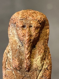 A death mask, a Ushabti, an oil lamp and a ritual cone with hieroglyphs, Egypt, 15th/1st C. B.C.