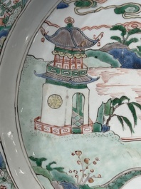 A Chinese famille verte 'river landscape' dish, artemisia leaf mark, Kangxi