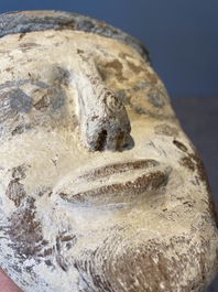 A death mask, a Ushabti, an oil lamp and a ritual cone with hieroglyphs, Egypt, 15th/1st C. B.C.