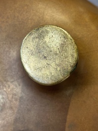 A large Chinese bronze tripod censer with two handles, 19th C.