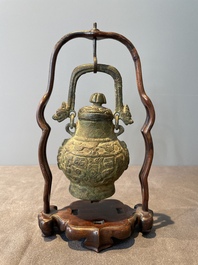 A varied collection of five Chinese bronze objects, 4th C. B.C./15th C.