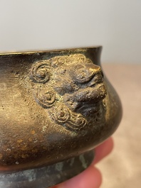 A varied collection of five Chinese bronze objects, 4th C. B.C./15th C.