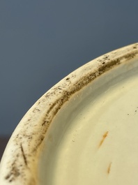 A Chinese copper-red-decorated 'lotus scroll' bottle vase, Qianlong