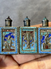 A pair of four-fold Chinese enamelled and engraved silver medicine bottles, 19th C.