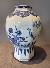 A Chinese octagonal blue and white 'birds and flowers' vase, Transitional period