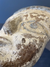 A death mask, a Ushabti, an oil lamp and a ritual cone with hieroglyphs, Egypt, 15th/1st C. B.C.