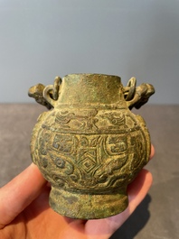 A varied collection of five Chinese bronze objects, 4th C. B.C./15th C.