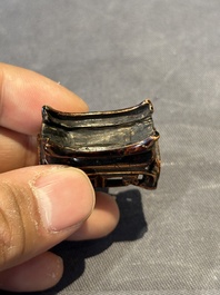 A Chinese famille rose 'Sanxing' snuff bottle, Qianlong mark and of the period