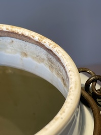 A fine Chinese blue and white 'Bleu de Hue' 'landscape' teapot with bronze mount, Chenghua mark, 18/19th C.