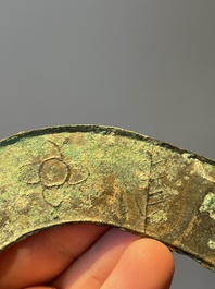 A varied collection of five Chinese bronze objects, 4th C. B.C./15th C.