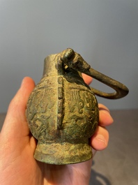 A varied collection of five Chinese bronze objects, 4th C. B.C./15th C.