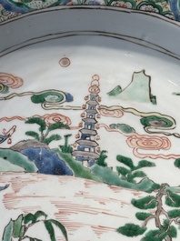 A Chinese famille verte 'river landscape' dish, artemisia leaf mark, Kangxi