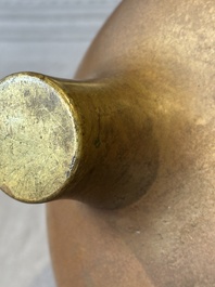 A large Chinese bronze tripod censer with two handles, 19th C.