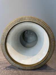 A large Chinese monochrome pink-glazed 'gu' vase with bronze mounts, 19/20th C.
