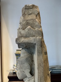A Burmese limestone stele with Buddha and two attendants with traces of gilding, 19th C.