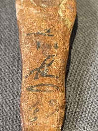 A death mask, a Ushabti, an oil lamp and a ritual cone with hieroglyphs, Egypt, 15th/1st C. B.C.