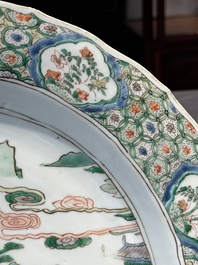 A Chinese famille verte 'river landscape' dish, artemisia leaf mark, Kangxi