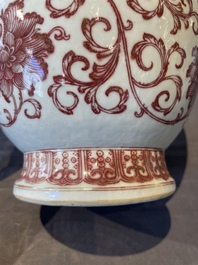 A Chinese copper-red-decorated 'lotus scroll' bottle vase, Qianlong